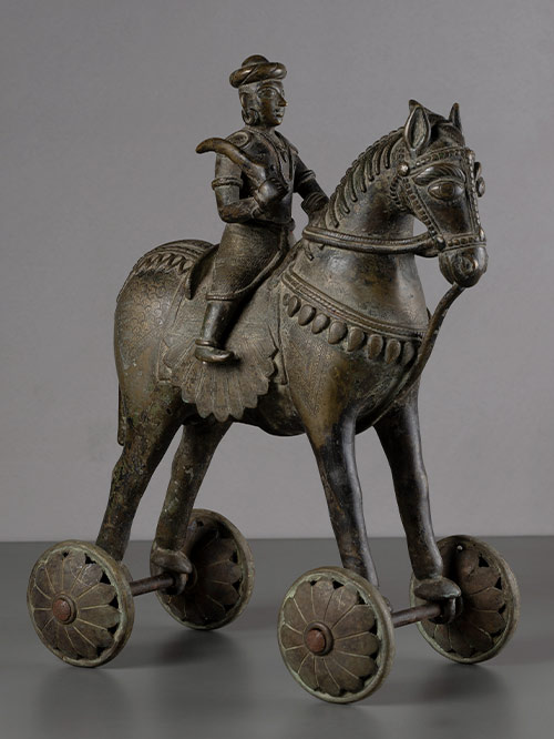 horse with rider on wheels