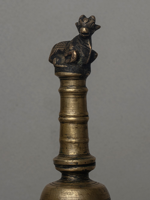 bell with nandi finial